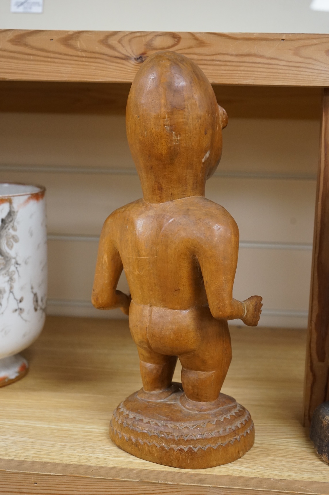 Three wood tribal figures, Africa, South Seas, tallest 37.5cm